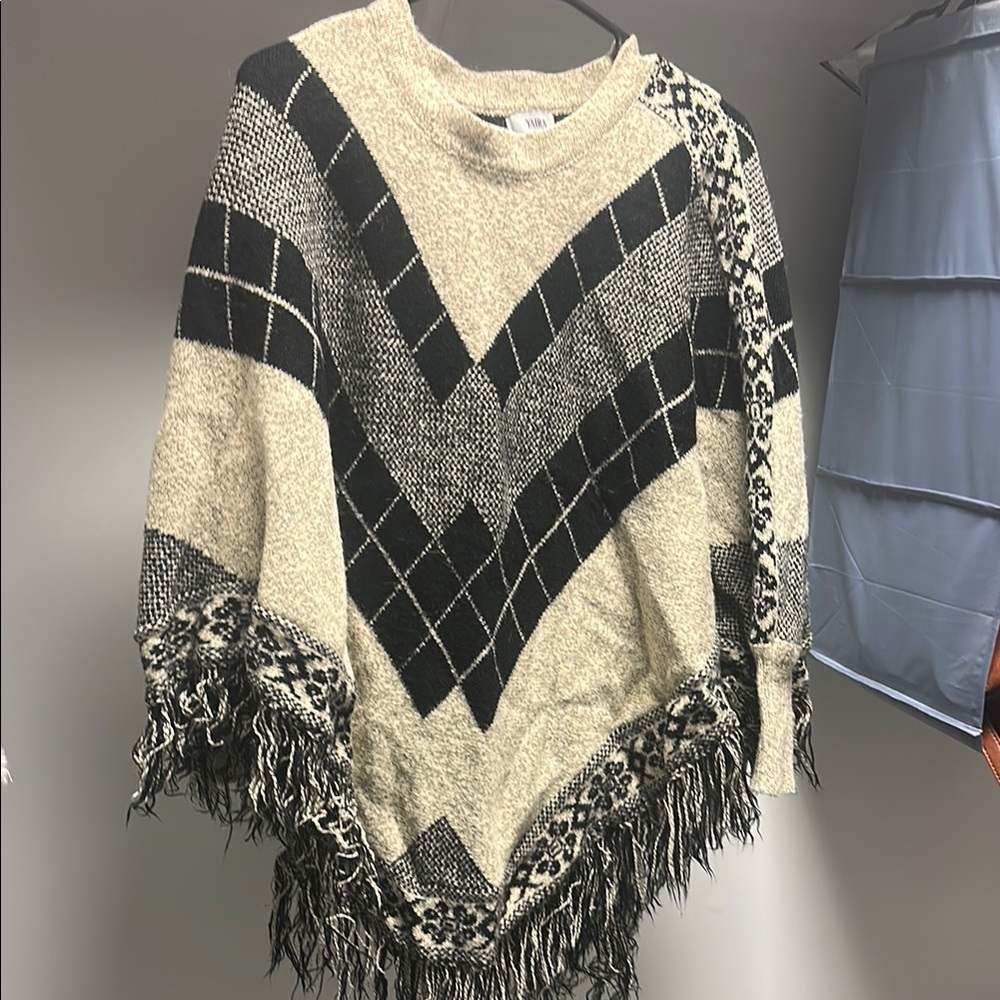 Chic Black and Cream Poncho with Fringe